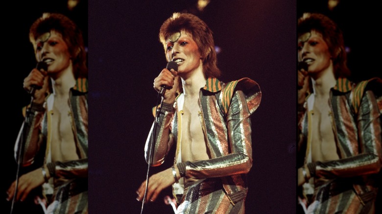 David Bowie performing costume face paint