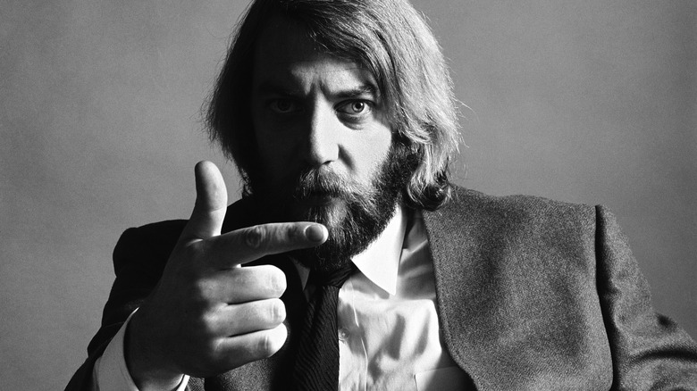 1970's Donald Sutherland pointing left