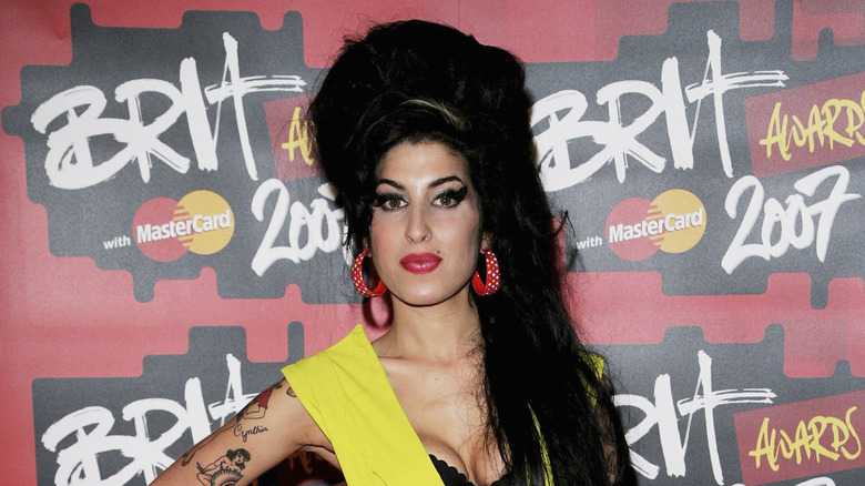 Amy Winehouse beehive hair yellow dress