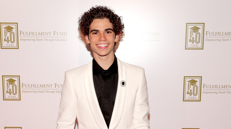 Cameron Boyce white jacket red carpet