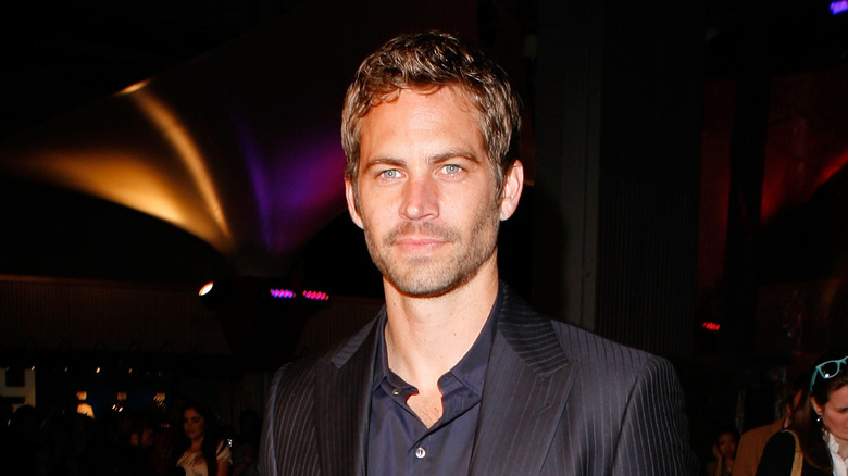 Paul Walker dark shirt and suit