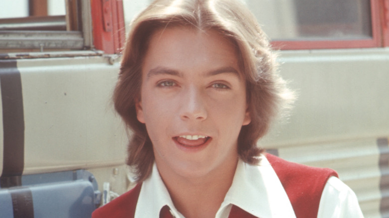 david cassidy in partridge family costume biting tongue