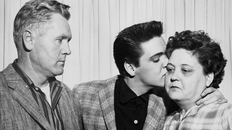 Elvis kissing Gladys on the cheek