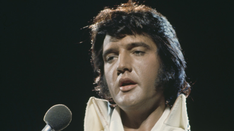 Elvis performing in jumpsuit