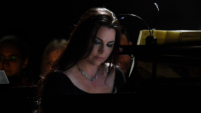 Amy Lee is backlit