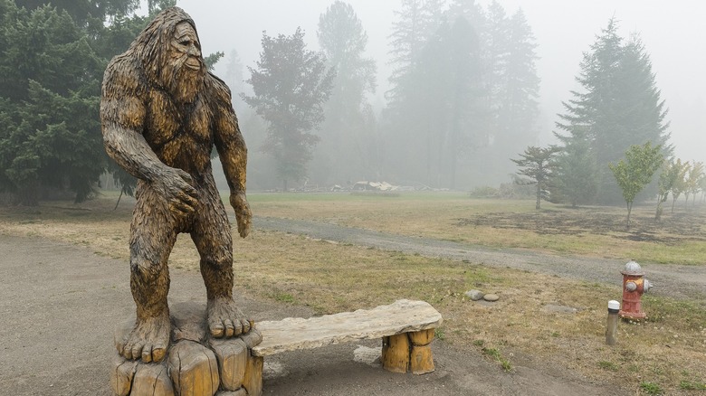 Wooden Sasquatch statue in fog