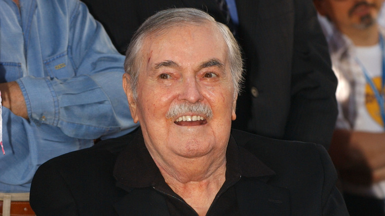 James Doohan sitting in chair