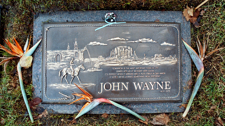 John Wayne gravestone with flowers