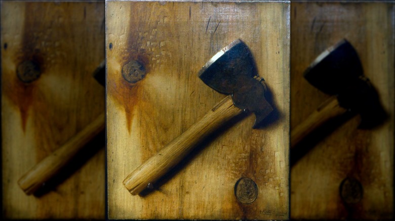 Trompe l'oeil painting of a hatchet