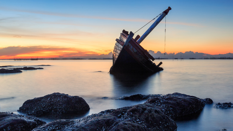 boat sunk in water