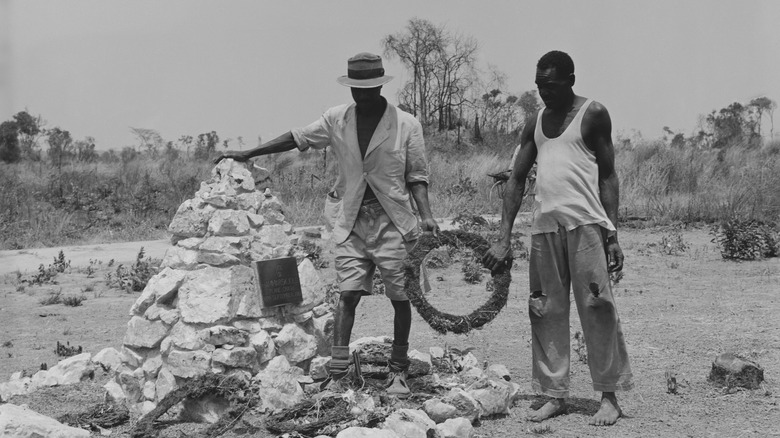 Dag Hammarskjöld memorial two men carry wreath