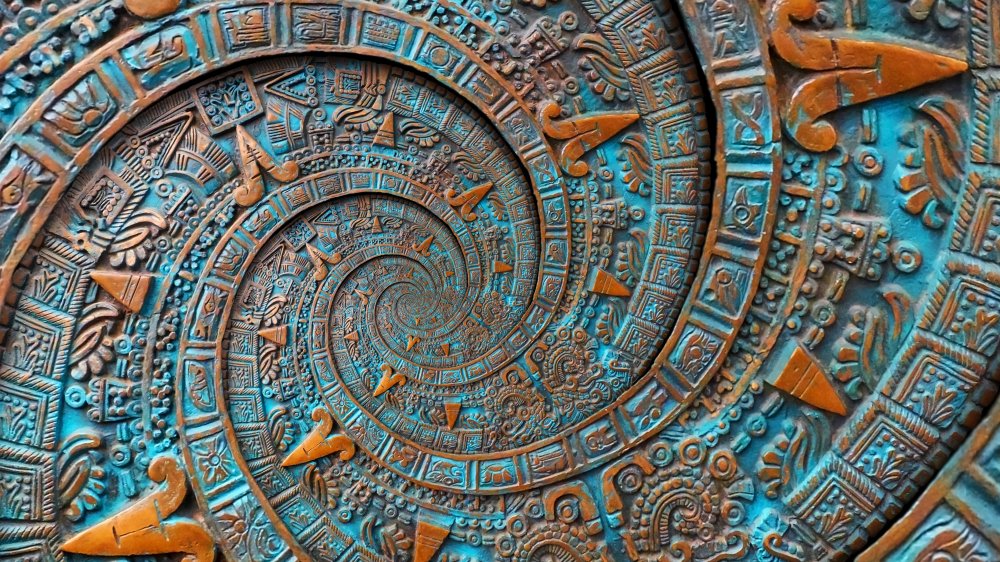 Aztec-calendar-style art piece swirl