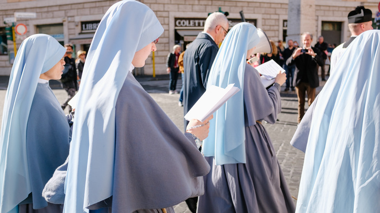 Vatican nuns procession with books