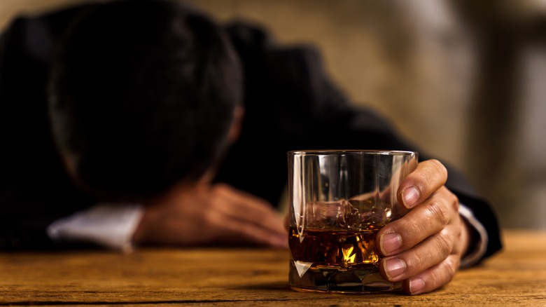 Young man drinking