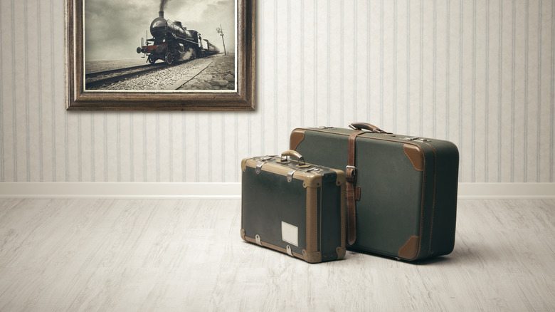 Old suitcases on floor