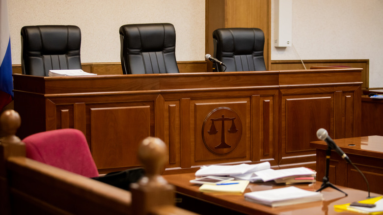 courtroom with three empty seats