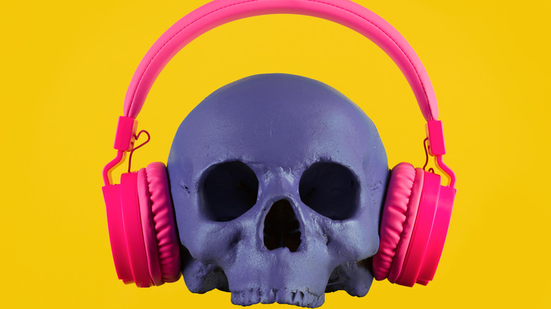 Purple skull wearing pink headphones