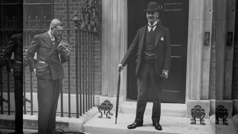 neville chamberlain with umbrella