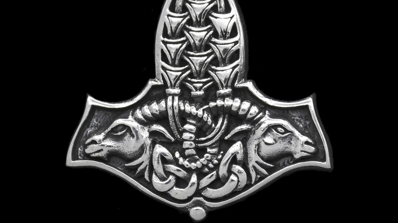 Ornate Mjölnir pendant showing Thor's goats.