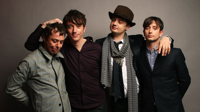 Babyshambles smiling suits standing