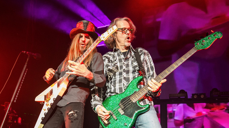 CC Deville and Bobby Dall of Poison playing onstage