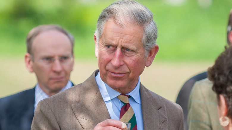 prince charles beige suit blues shirt