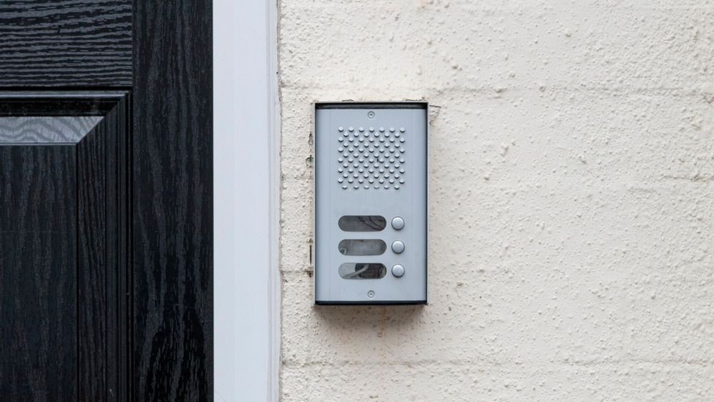 An intercom on a wall