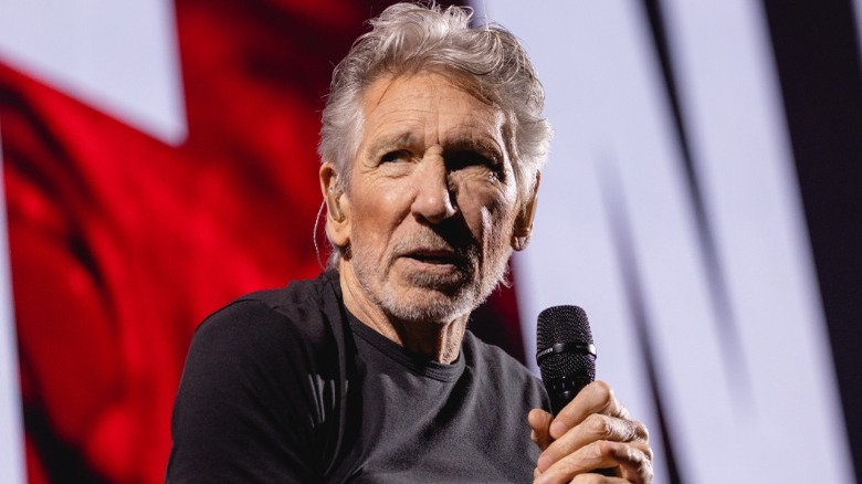 Roger Waters speaking into microphone