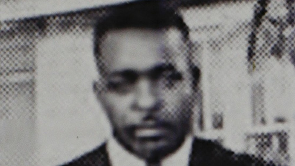 pixelated photo of Elbert Williams smirking