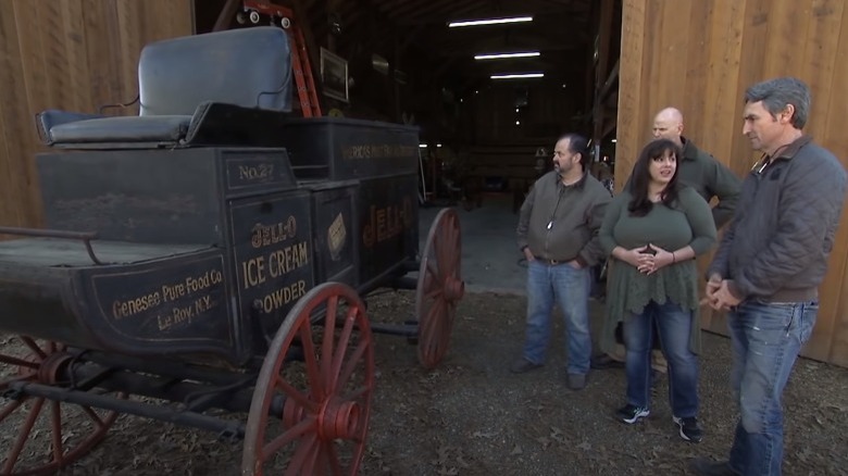 american pickers with customers and a kello wagon