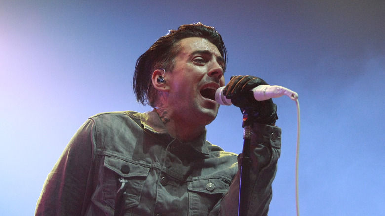 Ian Watkins singing microphone