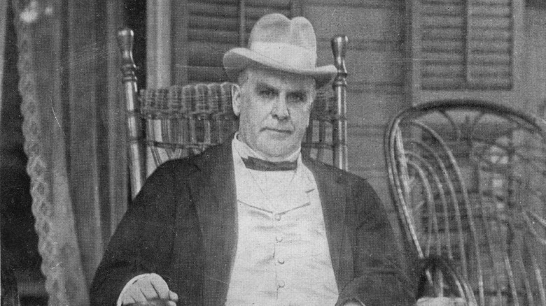 William McKinley sitting front porch wearing hat