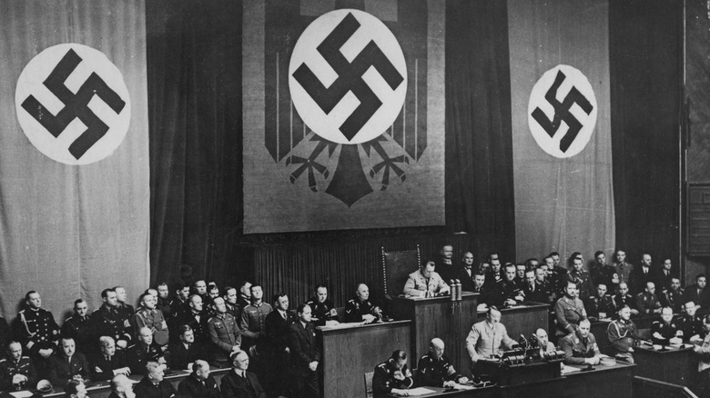 Swastikas drape the Reichstag 