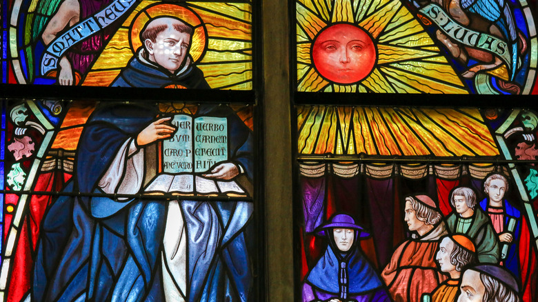 Thomas Aquinas stained glass scene