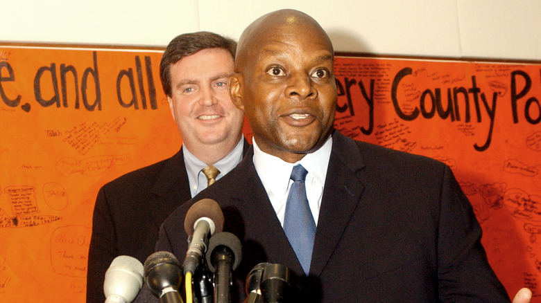 Charles Moose speaking at a press conference