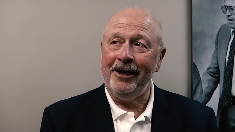 Frank Salerno in a white shirt and jacket speaking