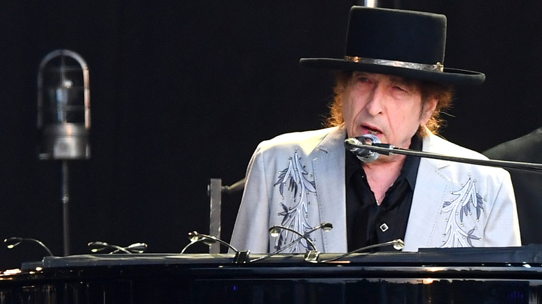 Bob Dylan singing at piano