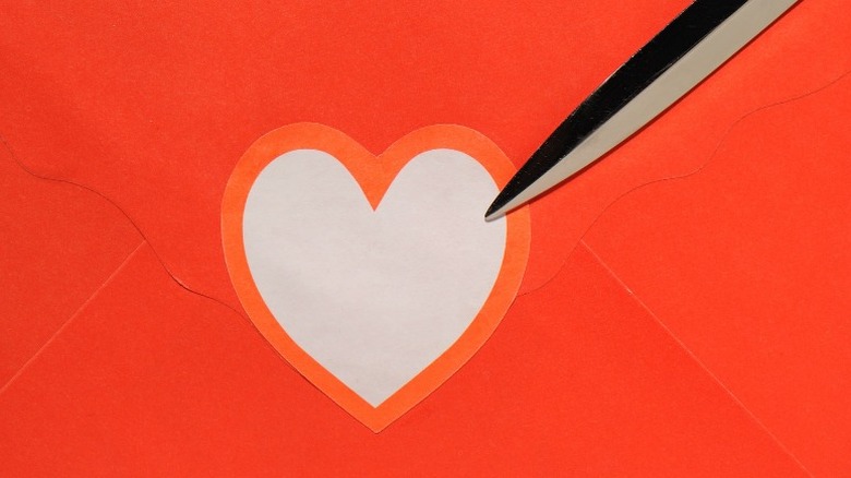 letter opener going into heart