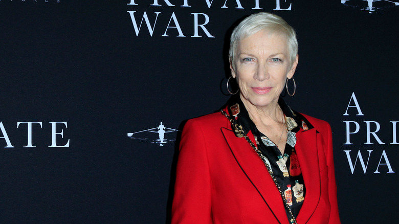 Annie Lennox wearing red