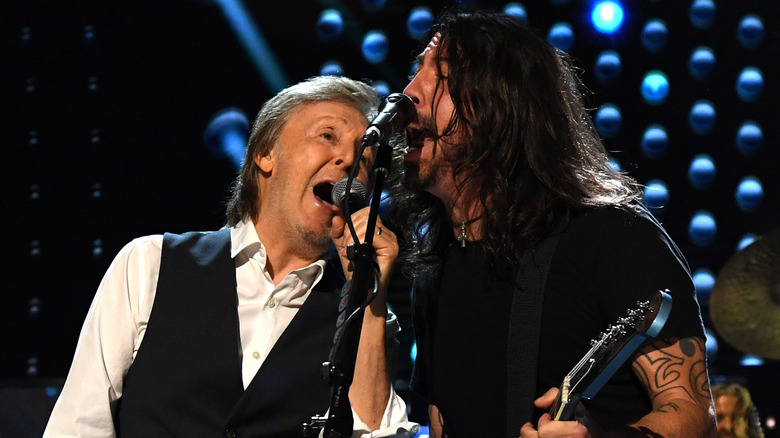 Paul McCartney performing with Dave Grohl