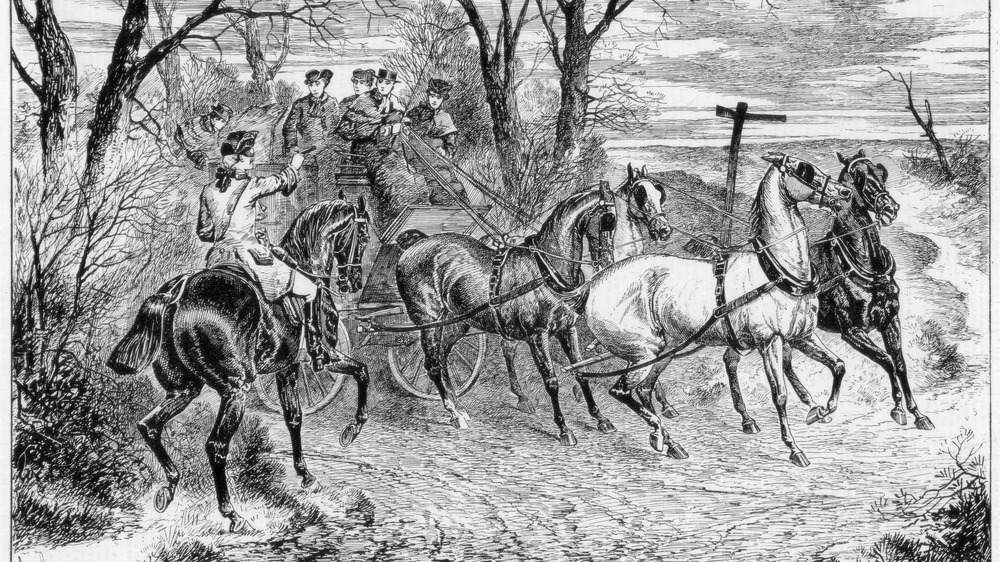 highway robber holding up wagon