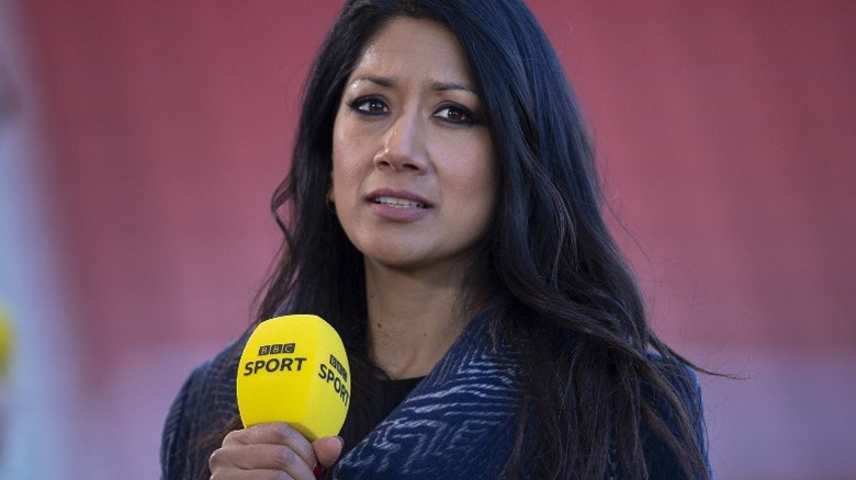 Reshmin Chowdhury, BBC reporter, with mic