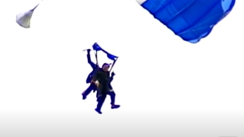 Still of George H.W. Bush skydiving