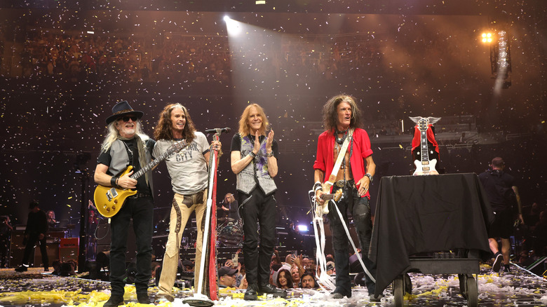 Aerosmith on stage with confetti