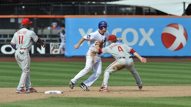 Bruntlett carrying out unassisted triple play