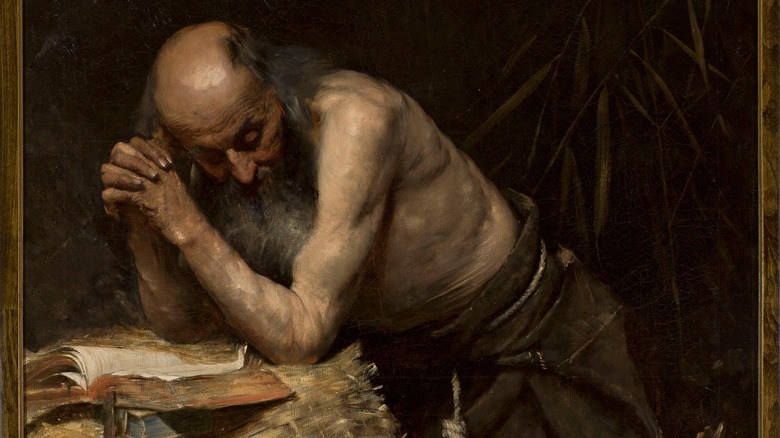 Anchorite, 1881 painting of old man praying with book