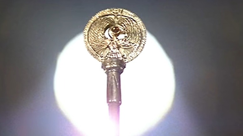 Headpiece staff of ra sun background