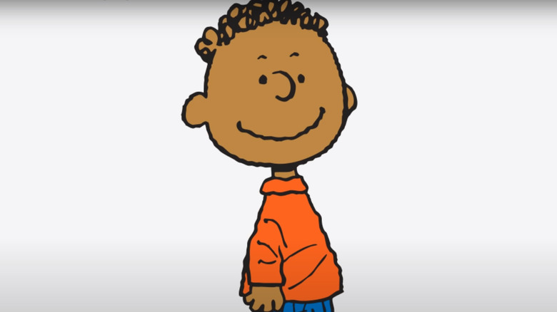 Franklin from the peanuts smiling