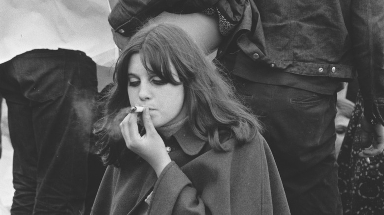 Hippie girl smoking a joint