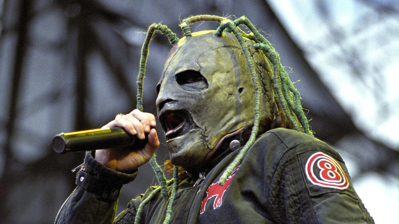 Corey Taylor singing into the mic